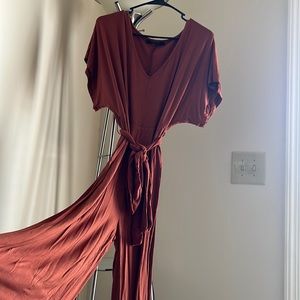 Jumpsuit/ romper super cute/ fits too long I’m short/ but it fits beautifully